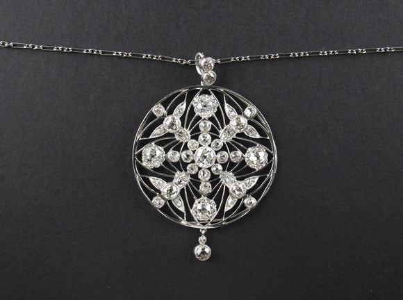 Edwardian platinum and diamond snowflake pendant with original chain