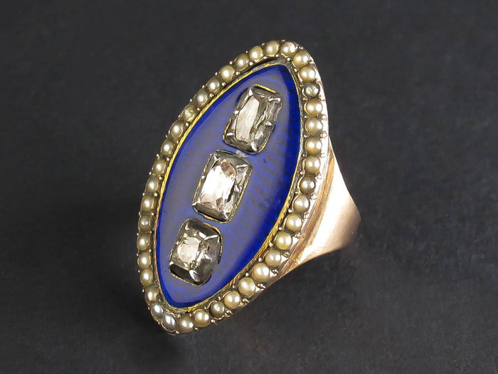 A Georgian XIX Century gold, table-cut diamond and blue enamel marquise ring