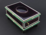 A silver-gilt singing bird automation box with guilloche in translucent violet and green enamel , the oval cover enamelled opening to reveal a singing feathered bird. Swiss 1960