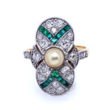 An Art Déco yellow gold platinum diamond and emerald ring centering a natural pearl