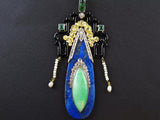 A rare Art Déco gold, platinum, jade and lapis pendant. 
