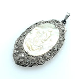 Art Deco platinum, diamond and carved mother-of-pearl pendant