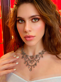 A XIX Century silver topped, Yellow gold and old-cut diamond necklace of draperie design.