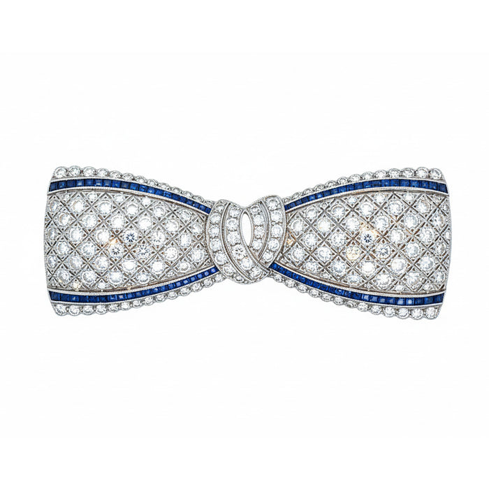 Spilla a fiocco in platino con diamanti e zaffiri Art Déco