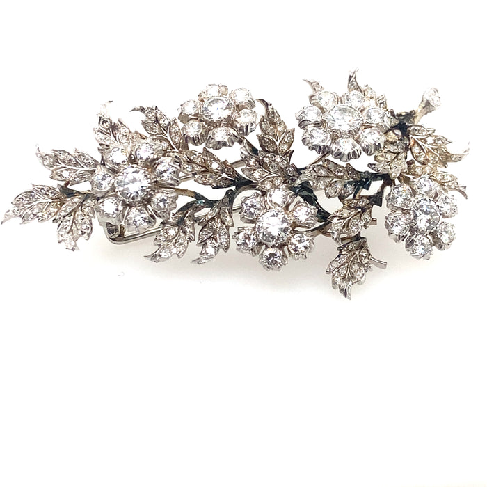 Spilla a forma di fiore in oro bianco e diamanti Buccellati