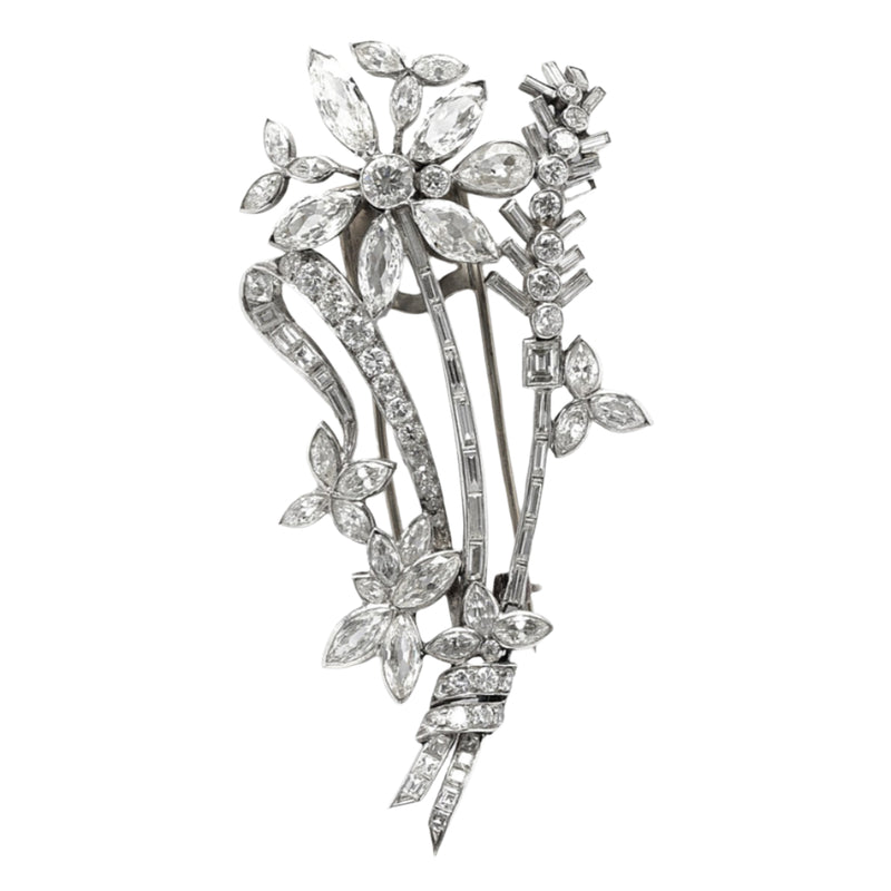 Spilla Art Déco in platino e diamanti a forma di ramo di fiori. Kutchinsky, Londra 1830 circa