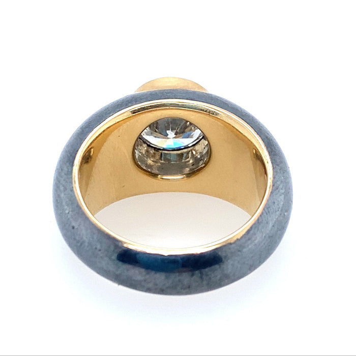 Anello in oro e argento con diamante