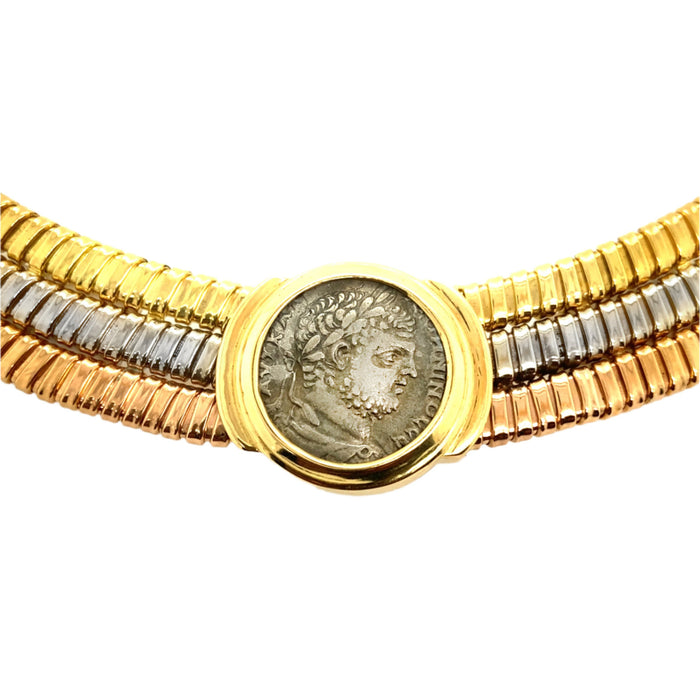 A rare triple tubogas chiocker , The three colors gold necklace centering an ancient roman coin depicting Caracalla. Bulgari, 1980 c.a. 