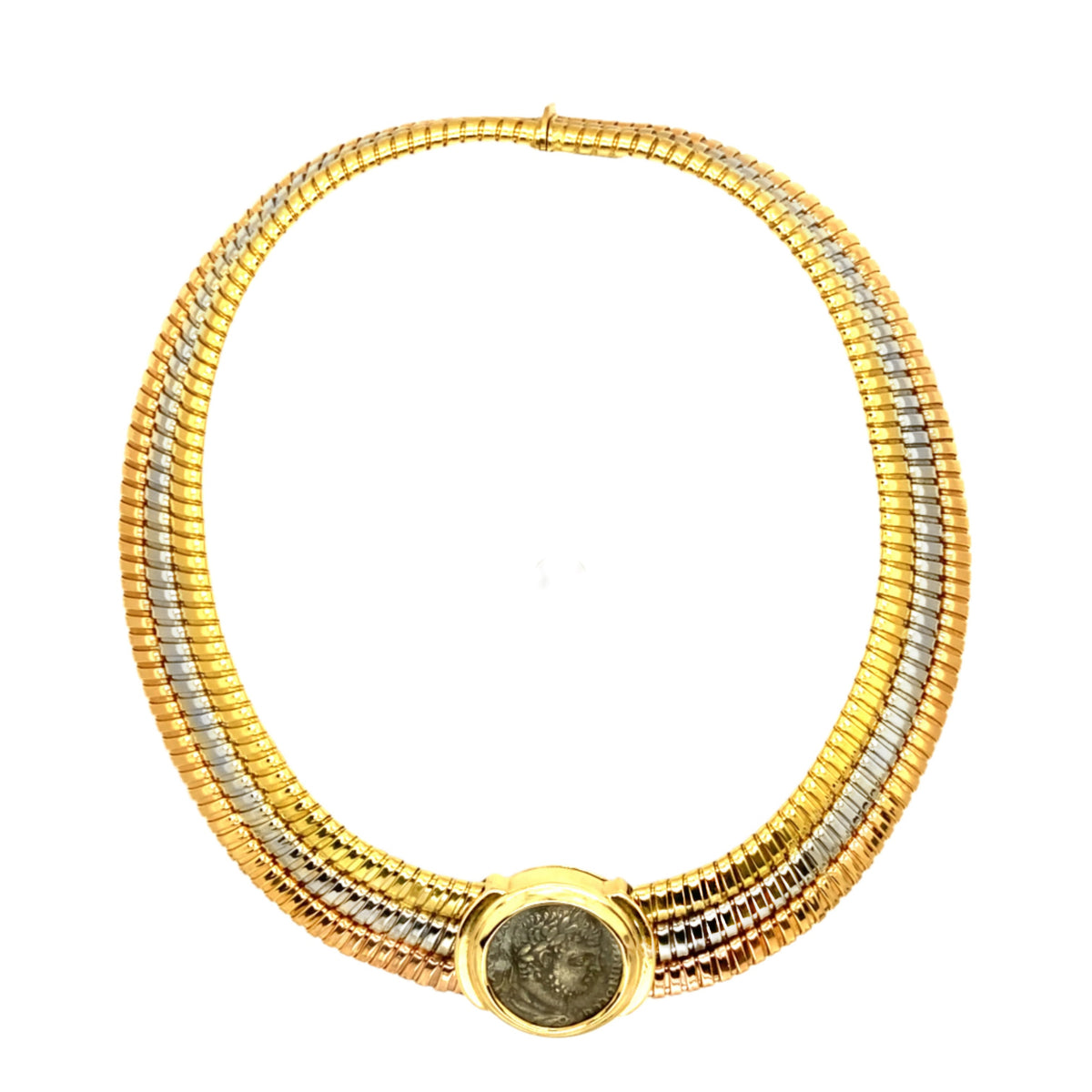 A rare triple tubogas chiocker , The three colors gold necklace centering an ancient roman coin depicting Caracalla. Bulgari, 1980 c.a. 