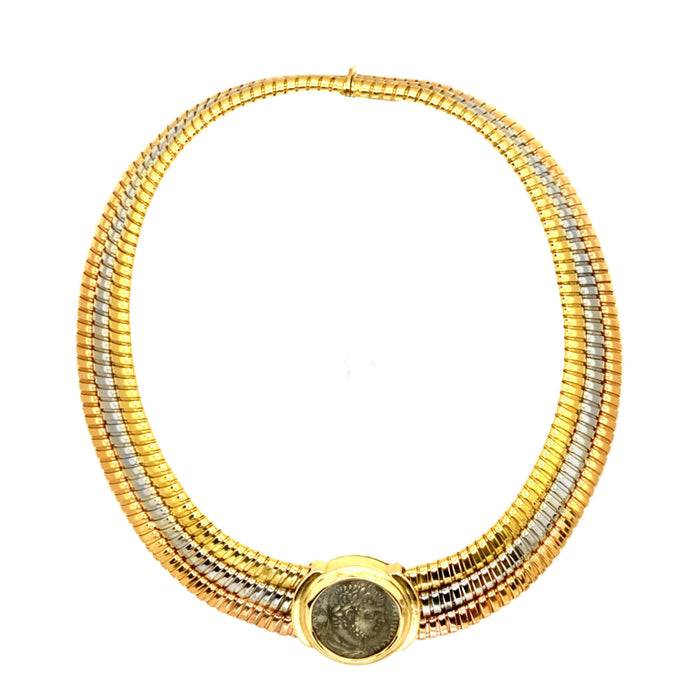 A rare triple tubogas chiocker , The three colors gold necklace centering an ancient roman coin depicting Caracalla. Bulgari, 1980 c.a. 
