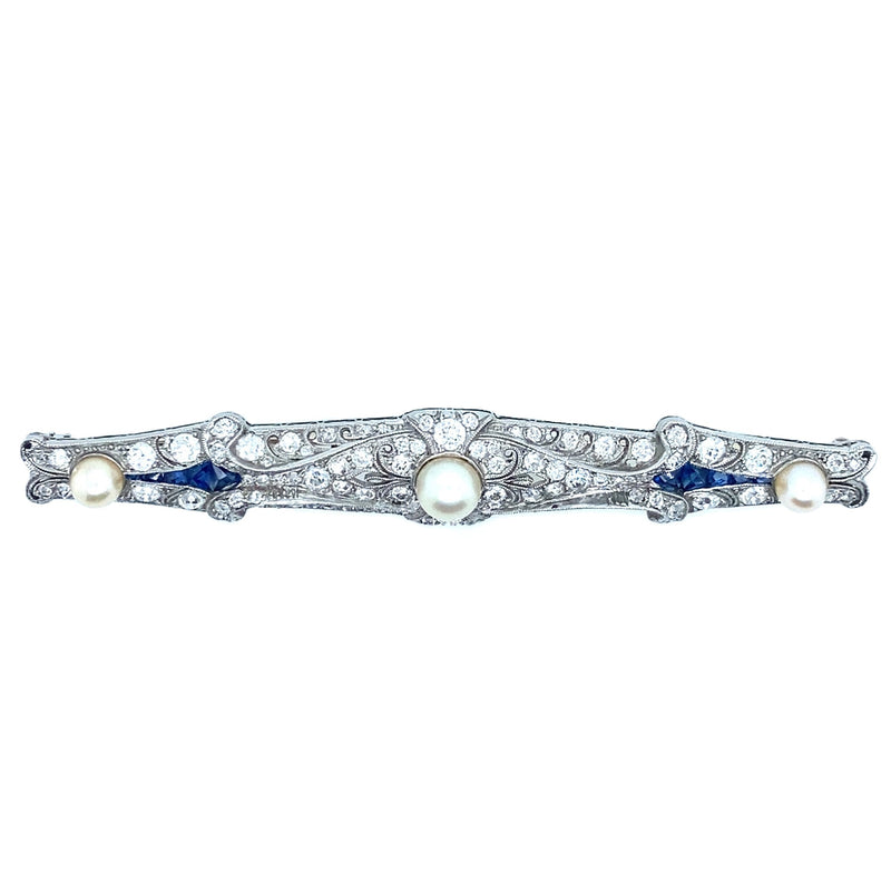 Spilla Art Déco in platino con diamanti, zaffiri e perle. 1920