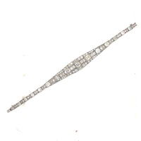 Bracciale Art Déco in platino, diamanti taglio brillante e taglio cuscino. Francia, 1930.