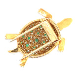 Spilla in oro giallo con smeraldi colombiani e zaffiri cabochon, 1950 c.a. 