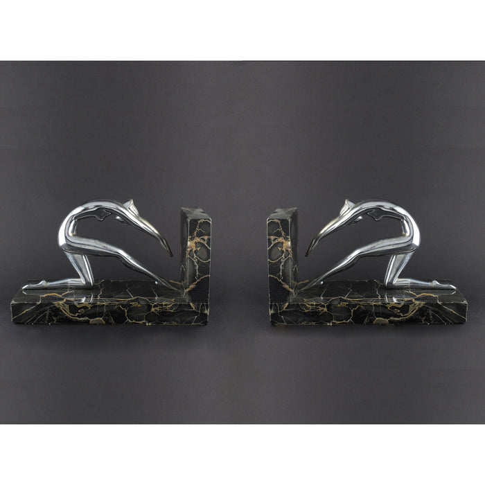 Fermalibri Art Déco in argento e marmo raffiguranti una donna che si tuffa