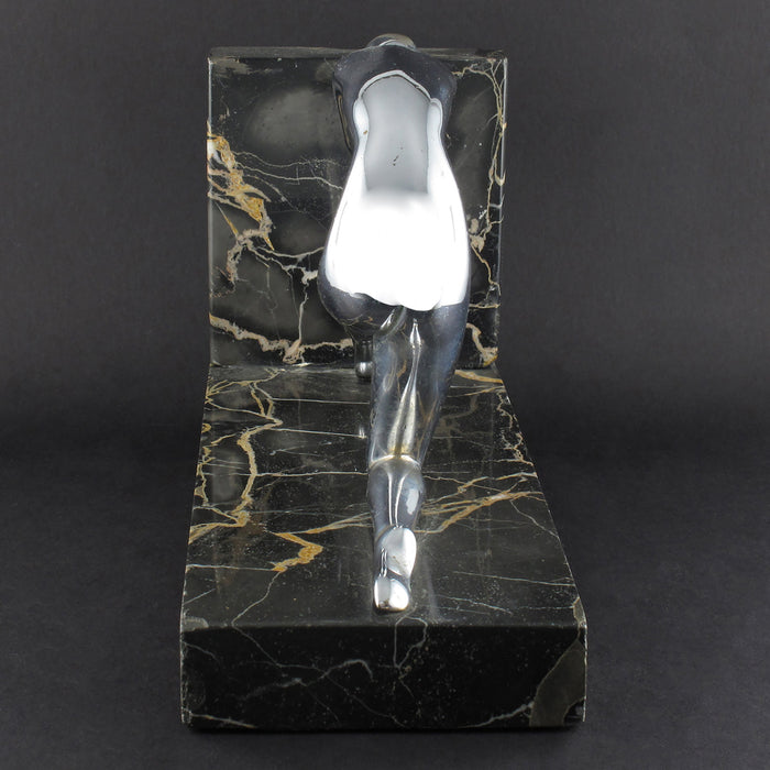 Fermalibri Art Déco in argento e marmo raffiguranti una donna che si tuffa