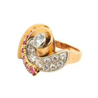 A yellow gold, diamond and ruby ring.