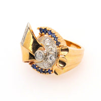 A yellow gold, diamond and sapphire bow ring