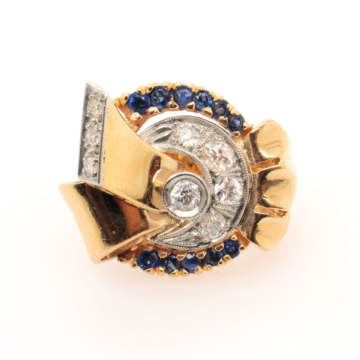 A yellow gold, diamond and sapphire bow ring