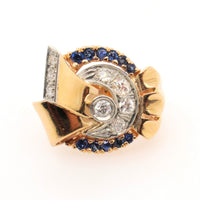 A yellow gold, diamond and sapphire bow ring