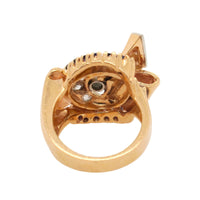 A yellow gold, diamond and sapphire bow ring