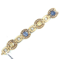 Bracciale in oro giallo, diamanti e zaffiri gialli/blu. Periodo 1950 circa