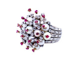 A platinum diamond, pearl and ruby cocktail ring. 1960 circa