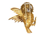 1960 Yellow gold, white enamel, diamond and ruby owl brooch