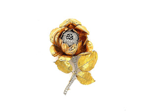 A yellow gold and diamond rose brooch. Period 1950 circa