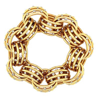 A yellow gold Gr. 162 and diamond bracelet. Period 1935 circa