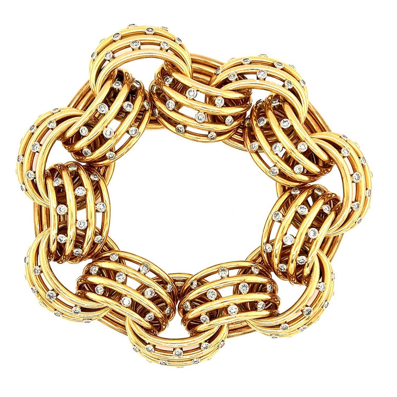 A yellow gold Gr. 162 and diamond bracelet. Period 1935 circa
