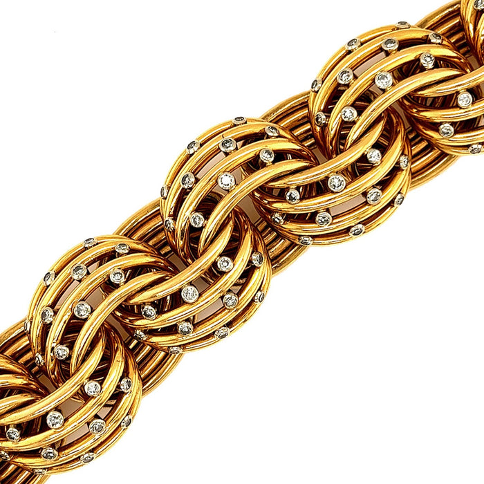 A yellow gold Gr. 162 and diamond bracelet. Period 1935 circa