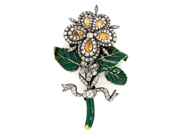 A XIX Century antique en tremblent brooch. The flower in silver topped Yellow gold with old-cut diamonds and topaz