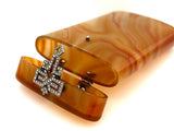 Janesich Art Déco agate, platinum and diamond cigarette case.