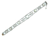 Garland Style Edwardian platinum diamond and natural pearl bracelet, 1910.