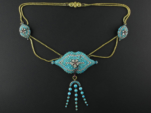 A Victorian XX Century yellow gold, silver, rubies turquoise and pearl necklace. 