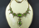 A XIX Century yellow gold, diamond and peridot necklace. Germany, late 19th century. In original fitted box.