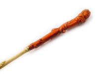 An antique  ivory and carved coral parasol. Southern Italy. 1860.