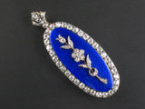 A Victorian XIX Century gold, silver and old-cut diamond pendant. Of flower design with blue guilloche enamel. 1850 c.a.