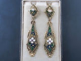 A pair of Victorian gold enameled earrings with natural pearls and rubies. England, 1850 c.a. In original fitted box