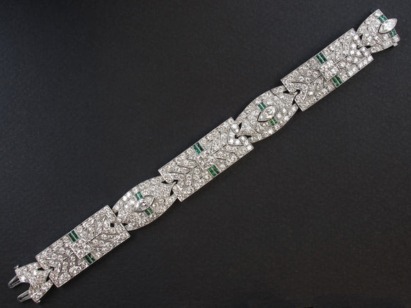 An Art Déco, platinum, diamond kt, 17 and emerald bracelet. 1930 c.a.