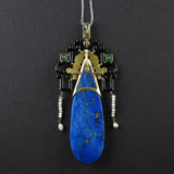 A rare Art Déco gold, platinum, jade and lapis pendant. 