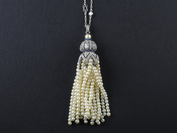 An Art Déco platinum, diamonds, sapphire and natural pearls pendant 