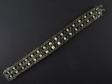 An Art Déco platinum, natural pearls, diamond and sapphire bracelet