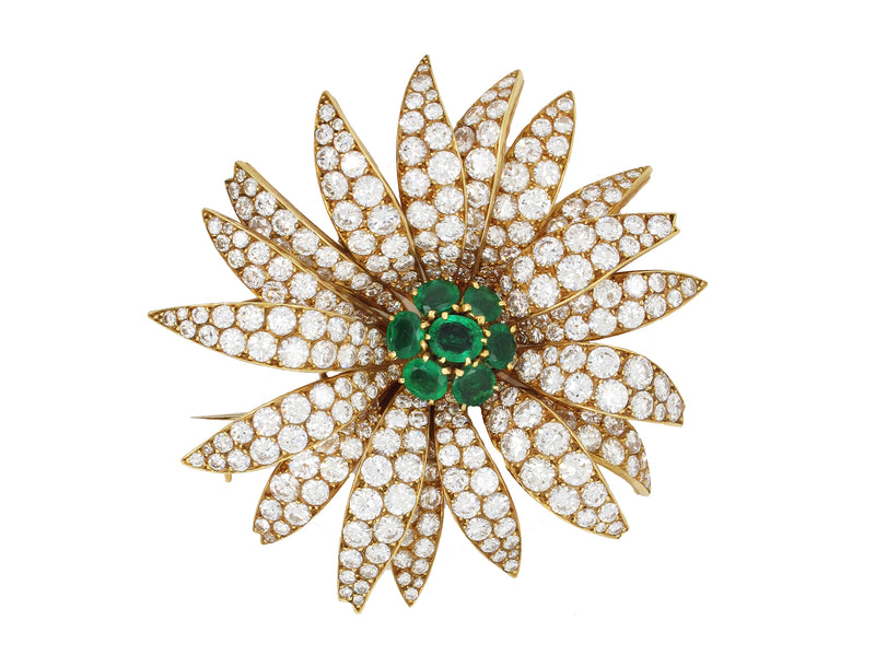 A yellow gold diamond and emerald Marguerite/Daisy Brooch. Van Cleef et Arpels, 1950 c