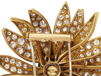 A yellow gold diamond and emerald Marguerite/Daisy Brooch. Van Cleef et Arpels, 1950 c