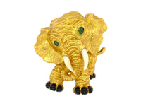 1960 Yellow gold, emerald, enamel and coral Van Cleef e Arpels elephant brooch