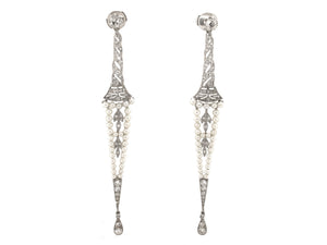 A Belle Epoque platinum, diamond and pearls earrings. 1910 circa