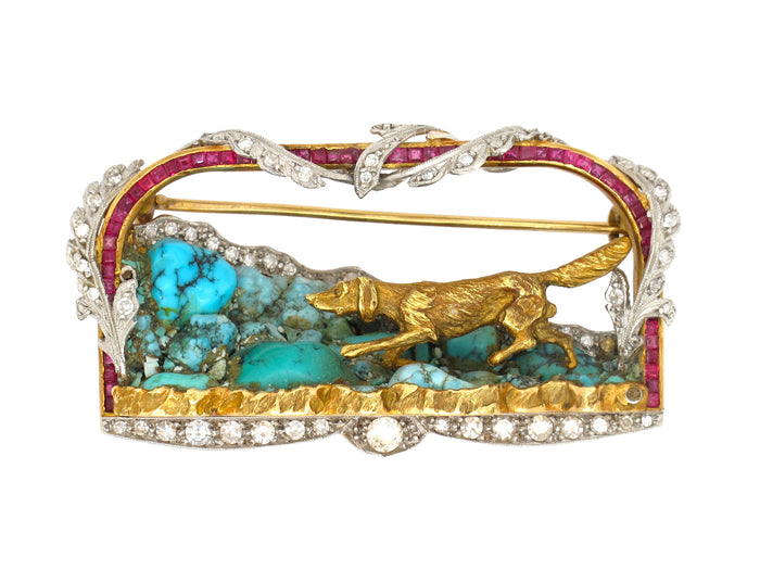 A very rare yellow gold and platinum brooch designed as a diamond and ruby frame. Italy 