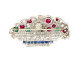 Art Déco platinum diamond, ruby emerald and sapphire basket brooch. France, 1925 c.a.