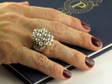 A platinum diamond, pearl and ruby cocktail ring. 1960 circa